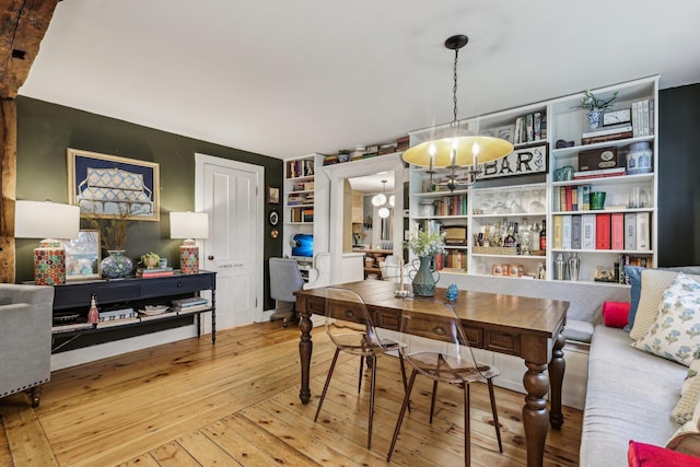 26 Middle St, Amherst, NH 03031 - dining room with a chandelier and wood-type flooring