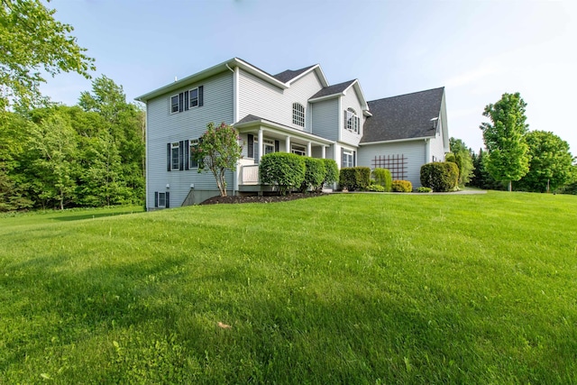 275 Petit Rd, Coventry, VT 05825 - view of front facade with a front yard and central AC unit