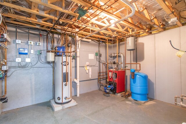 275 Petit Rd, Coventry, VT 05825 - utility room featuring water heater and a heating unit