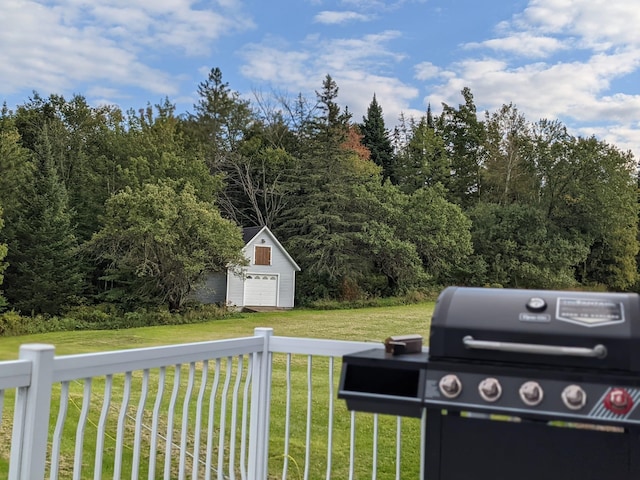 275 Petit Rd, Coventry, VT 05825 - view of grassy yard featuring an outdoor structure and a garage