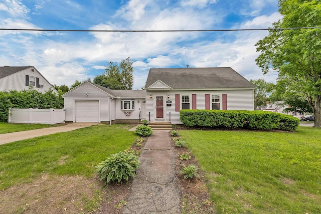 190 Anthony St, Manchester, NH 03103 - cape cod house with concrete driveway and an attached garage