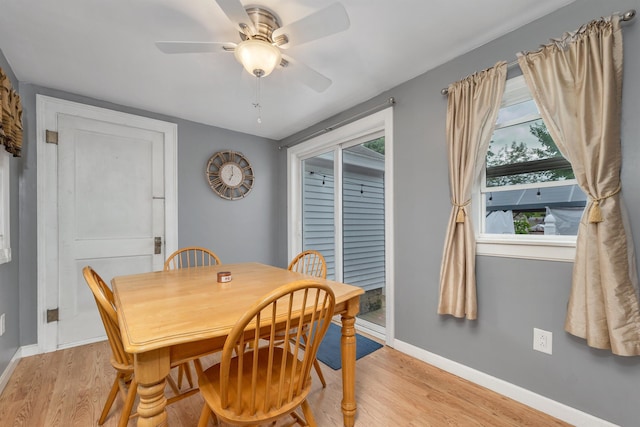 190 Anthony St, Manchester, NH 03103 - dining area featuring light wood-style floors, baseboards, and a ceiling fan