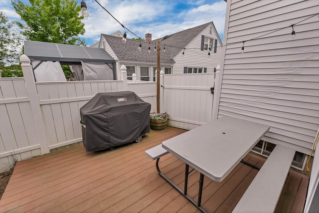 190 Anthony St, Manchester, NH 03103 - wooden deck with a grill