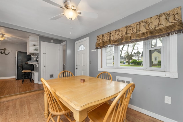 190 Anthony St, Manchester, NH 03103 - dining space with a ceiling fan, baseboards, and light wood-style flooring
