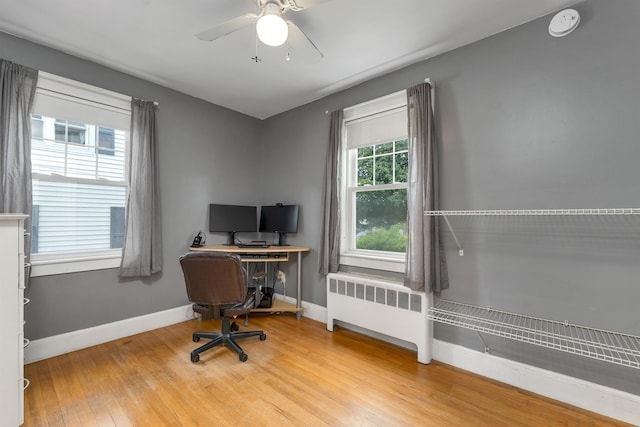 190 Anthony St, Manchester, NH 03103 - office with radiator heating unit, baseboards, wood finished floors, and ceiling fan