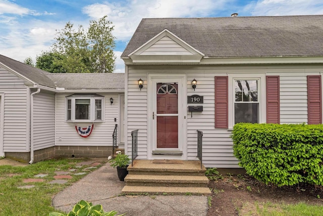 190 Anthony St, Manchester, NH 03103 - view of front of property featuring roof with shingles
