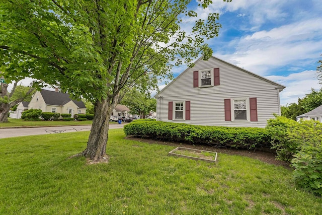 190 Anthony St, Manchester, NH 03103 - view of side of home with a lawn