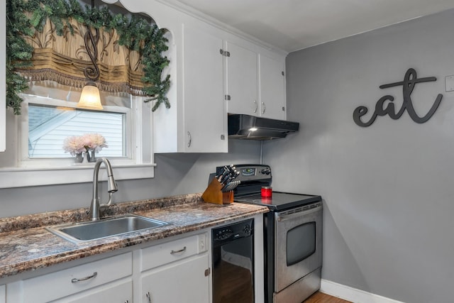190 Anthony St, Manchester, NH 03103 - kitchen with stainless steel range with electric stovetop, a sink, black dishwasher, under cabinet range hood, and white cabinets