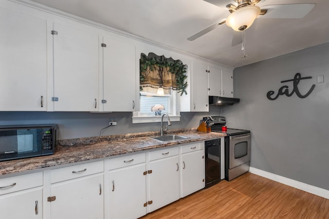 190 Anthony St, Manchester, NH 03103 - kitchen featuring black appliances, a sink, under cabinet range hood, light wood-style floors, and white cabinetry
