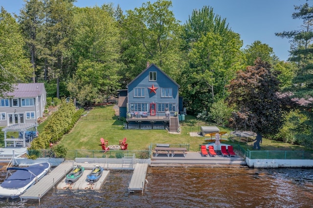 26 Association Dr, Northwood, NH 03261 - back of house with a deck with water view and an outdoor fire pit