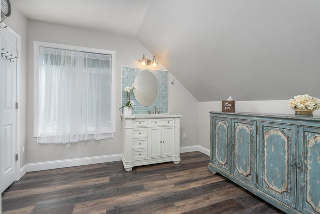 26 Association Dr, Northwood, NH 03261 - bathroom with vanity, vaulted ceiling, baseboards, and wood finished floors