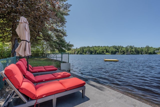 26 Association Dr, Northwood, NH 03261 - view of patio / terrace featuring a water view and a wooded view