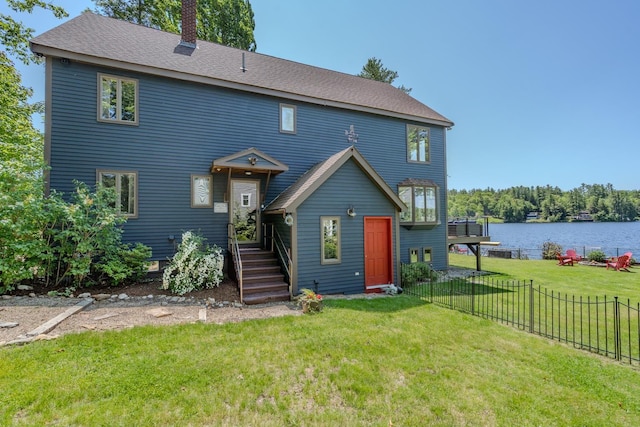 26 Association Dr, Northwood, NH 03261 - rear view of property featuring a chimney, a water view, and roof with shingles