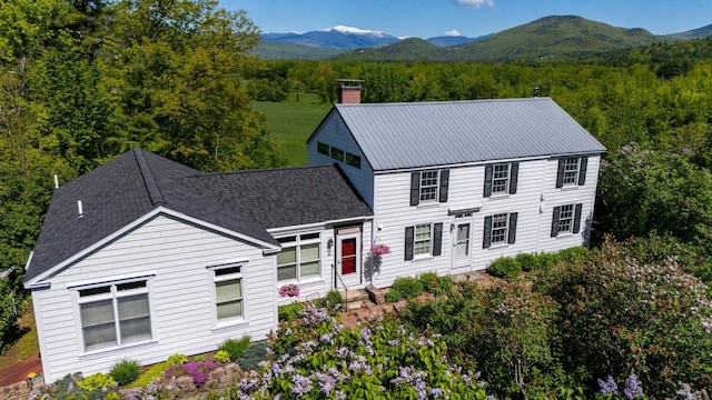 26 Balcony Seat Vw, Conway, NH 03860 - colonial-style house with a mountain view, a view of trees, and a chimney