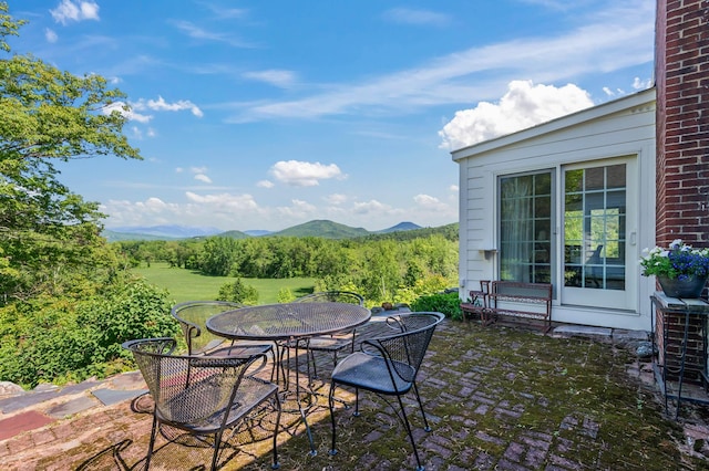 26 Balcony Seat Vw, Conway, NH 03860 - view of patio with outdoor dining space and a mountain view