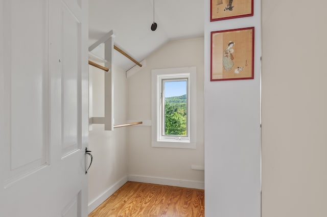 26 Balcony Seat Vw, Conway, NH 03860 - walk in closet featuring vaulted ceiling and light wood finished floors