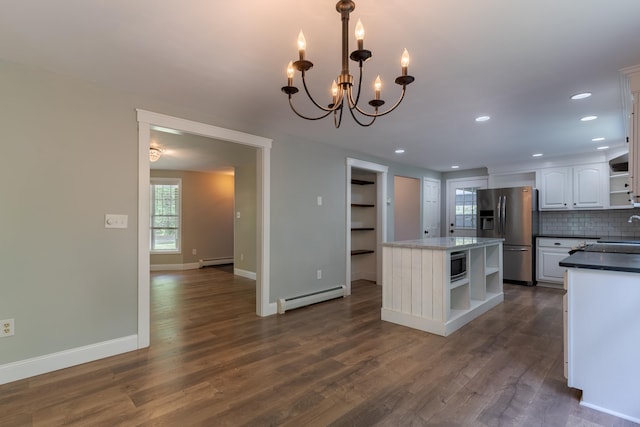 11 Rabbit Ln, Barrington, NH 03825 - kitchen featuring open shelves, a baseboard heating unit, stainless steel appliances, and recessed lighting