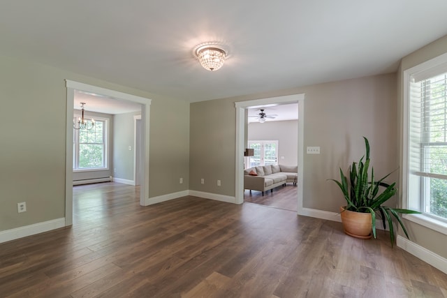 11 Rabbit Ln, Barrington, NH 03825 - spare room with a chandelier, healthy amount of natural light, and wood finished floors