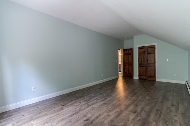 11 Rabbit Ln, Barrington, NH 03825 - additional living space with lofted ceiling, dark wood-style floors, and baseboards