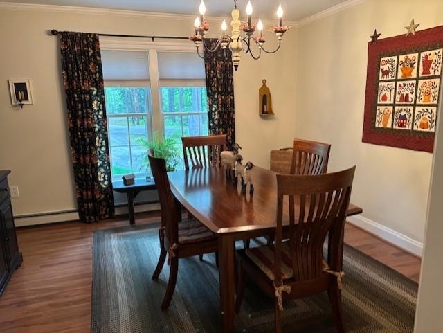 3 Dove St, Wolfeboro, NH 03894 - dining room featuring a chandelier, wood finished floors, ornamental molding, baseboards, and baseboard heating