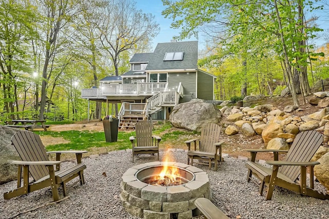 270 Beechnut Dr, Conway, NH 03860 - view of patio / terrace with a fire pit, stairway, and a deck