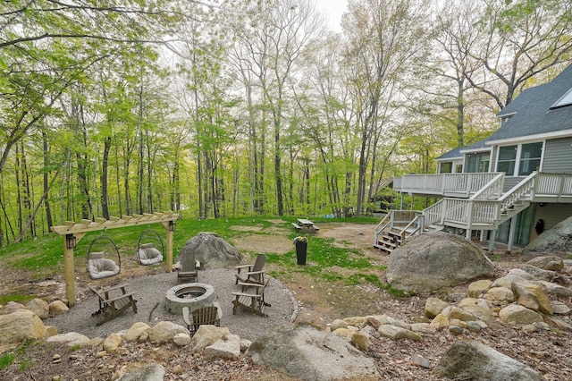 270 Beechnut Dr, Conway, NH 03860 - view of yard featuring a fire pit, stairway, and a wooden deck