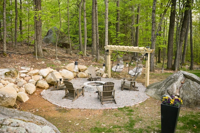 270 Beechnut Dr, Conway, NH 03860 - view of patio featuring an outdoor fire pit