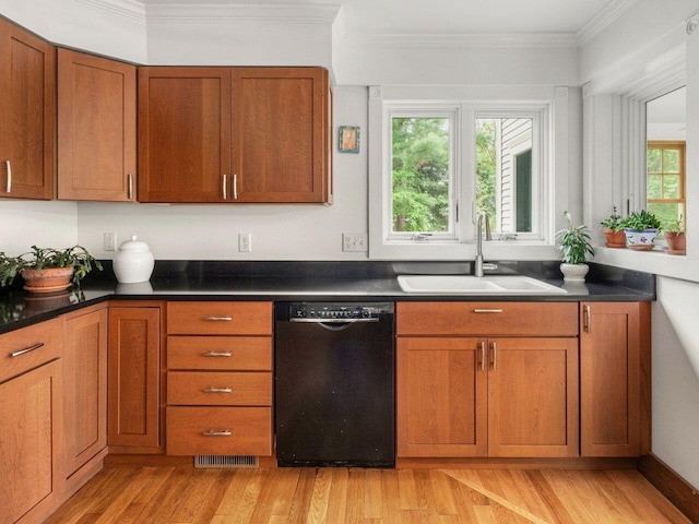 278 S Cove Rd, Burlington, VT 05401 - kitchen with dishwasher, a sink, light wood finished floors, brown cabinets, and ornamental molding