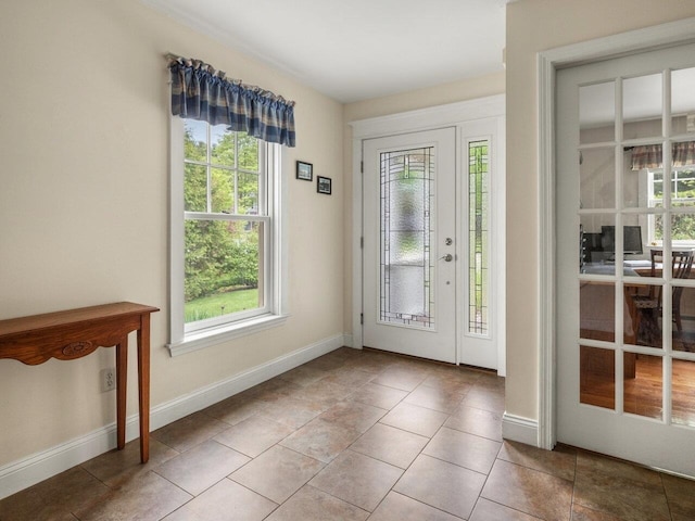 278 S Cove Rd, Burlington, VT 05401 - doorway to outside with plenty of natural light, tile patterned flooring, and baseboards