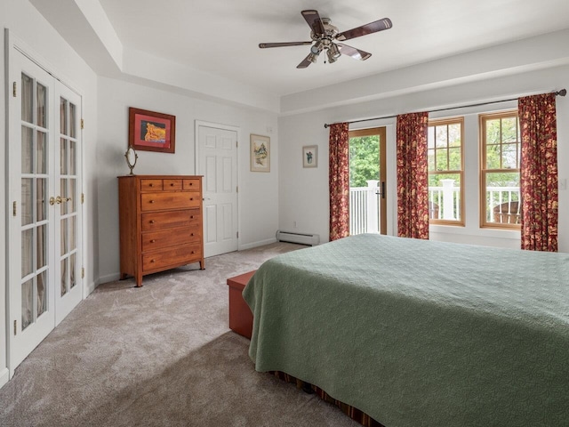 278 S Cove Rd, Burlington, VT 05401 - carpeted bedroom with baseboard heating, access to exterior, french doors, and a ceiling fan