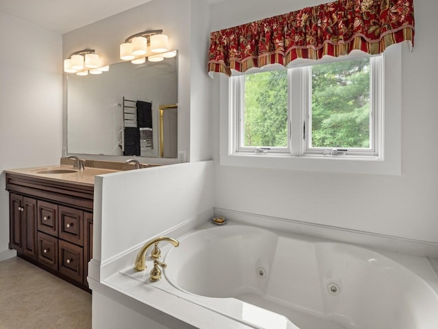 278 S Cove Rd, Burlington, VT 05401 - bathroom with a tub with jets, vanity, and tile patterned flooring