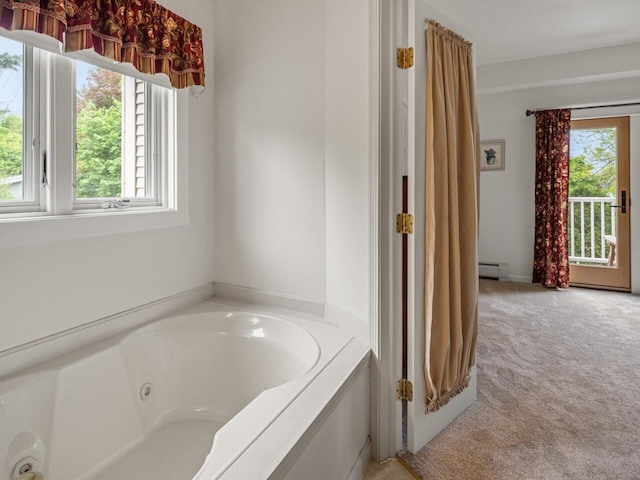 278 S Cove Rd, Burlington, VT 05401 - full bath with healthy amount of natural light, a baseboard heating unit, and a whirlpool tub