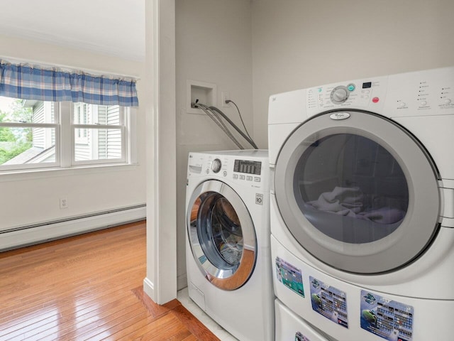 278 S Cove Rd, Burlington, VT 05401 - laundry room with washing machine and clothes dryer, light wood-style floors, and baseboard heating