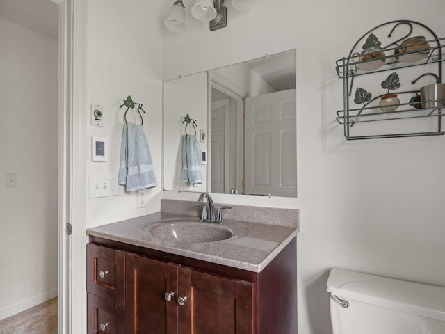 278 S Cove Rd, Burlington, VT 05401 - half bathroom with vanity and toilet