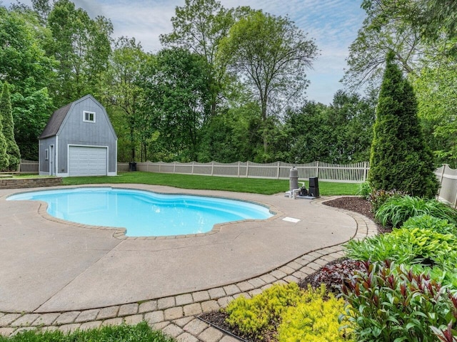 278 S Cove Rd, Burlington, VT 05401 - view of swimming pool featuring an outdoor structure, a fenced backyard, and view of scattered trees