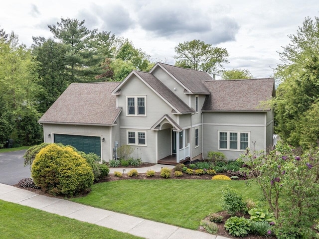 278 S Cove Rd, Burlington, VT 05401 - view of front of home featuring an attached garage, roof with shingles, and a front yard