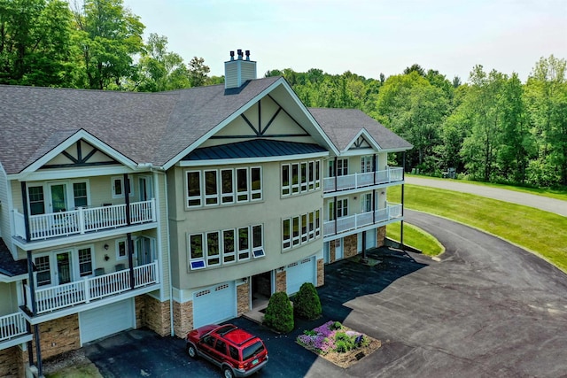 120 Pepin Dr Unit B 6, Newport City, VT 05855 - view of property with driveway and a garage