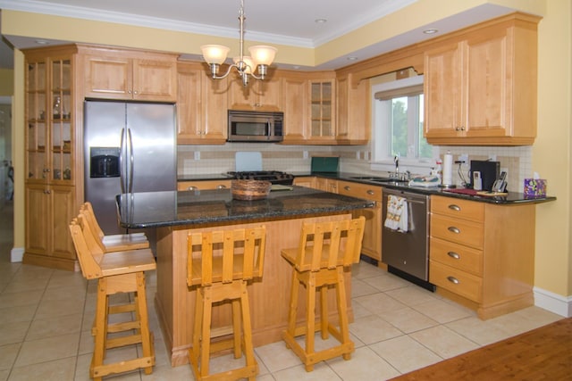 120 Pepin Dr Unit B 6, Newport City, VT 05855 - kitchen with appliances with stainless steel finishes, a sink, a chandelier, tasteful backsplash, and crown molding