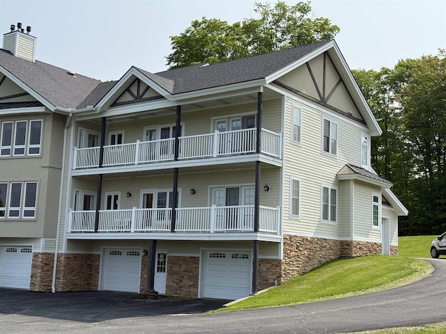 120 Pepin Dr Unit B 6, Newport City, VT 05855 - view of building exterior with an attached garage and driveway