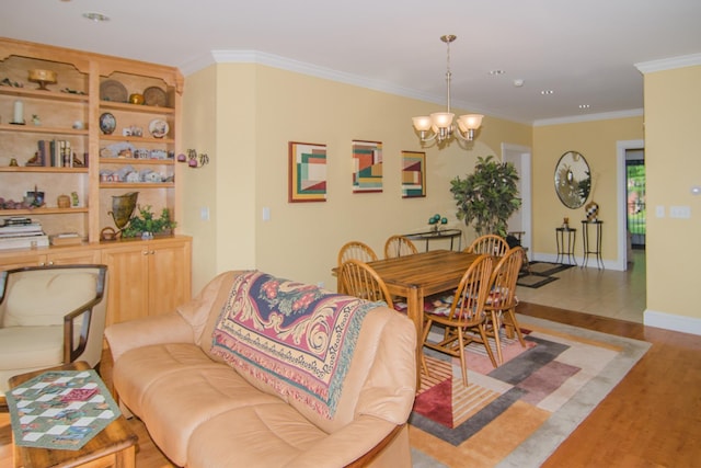 120 Pepin Dr Unit B 6, Newport City, VT 05855 - dining space featuring a chandelier, light wood-style floors, crown molding, and baseboards