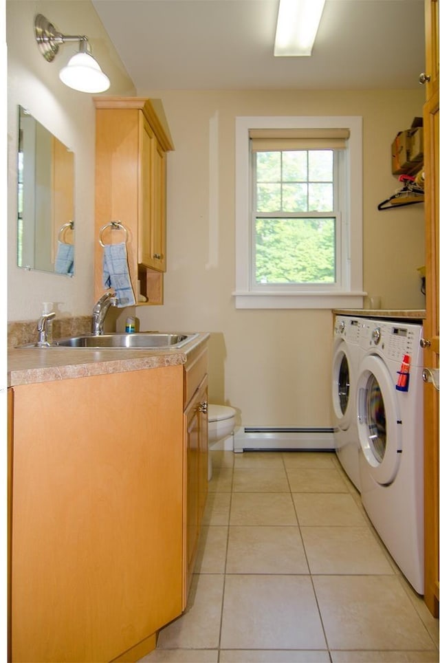 120 Pepin Dr Unit B 6, Newport City, VT 05855 - laundry room with a baseboard heating unit, independent washer and dryer, and light tile patterned flooring