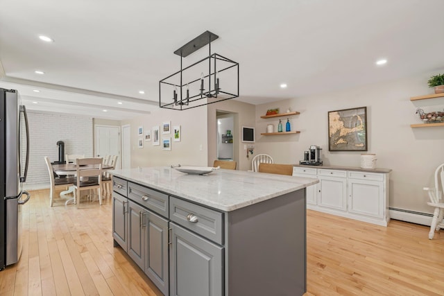78 Hitching Post Ln, Bedford, NH 03110 - kitchen featuring freestanding refrigerator, gray cabinetry, white cabinets, a kitchen island, and open shelves