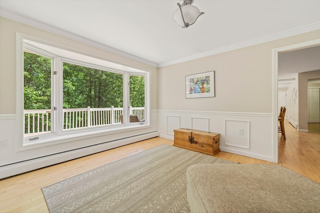 78 Hitching Post Ln, Bedford, NH 03110 - unfurnished room featuring a baseboard radiator, hardwood / wood-style floors, crown molding, and wainscoting