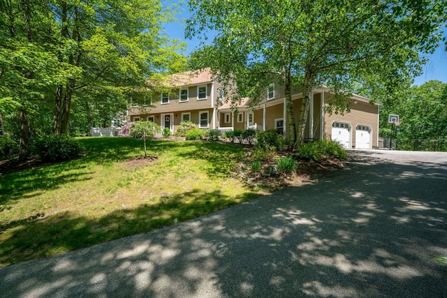 78 Hitching Post Ln, Bedford, NH 03110 - colonial house featuring asphalt driveway and a front lawn