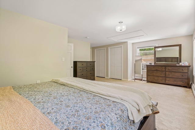 78 Hitching Post Ln, Bedford, NH 03110 - carpeted bedroom featuring attic access, multiple closets, and a baseboard radiator