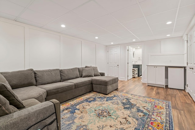 78 Hitching Post Ln, Bedford, NH 03110 - living room with a decorative wall, wood finished floors, a drop ceiling, and recessed lighting