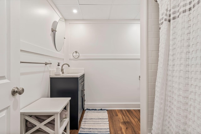 78 Hitching Post Ln, Bedford, NH 03110 - bathroom featuring vanity, wood finished floors, baseboards, and a shower with curtain