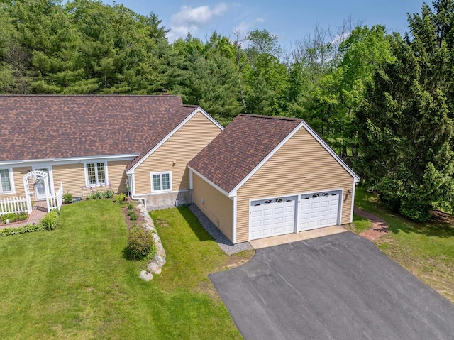 82 Garden Cir, Laconia, NH 03246 - view of front of house with a shingled roof and a front lawn