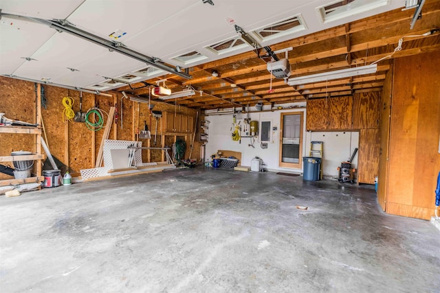 82 Garden Cir, Laconia, NH 03246 - garage with a garage door opener