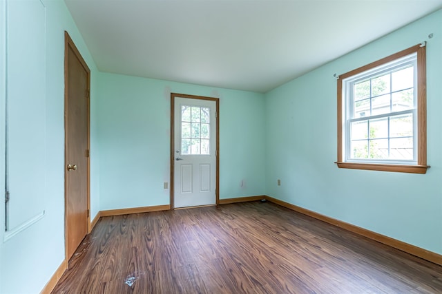 2 Ramsey Dr, Rochester, NH 03839 - unfurnished room with dark wood-style flooring, plenty of natural light, and baseboards